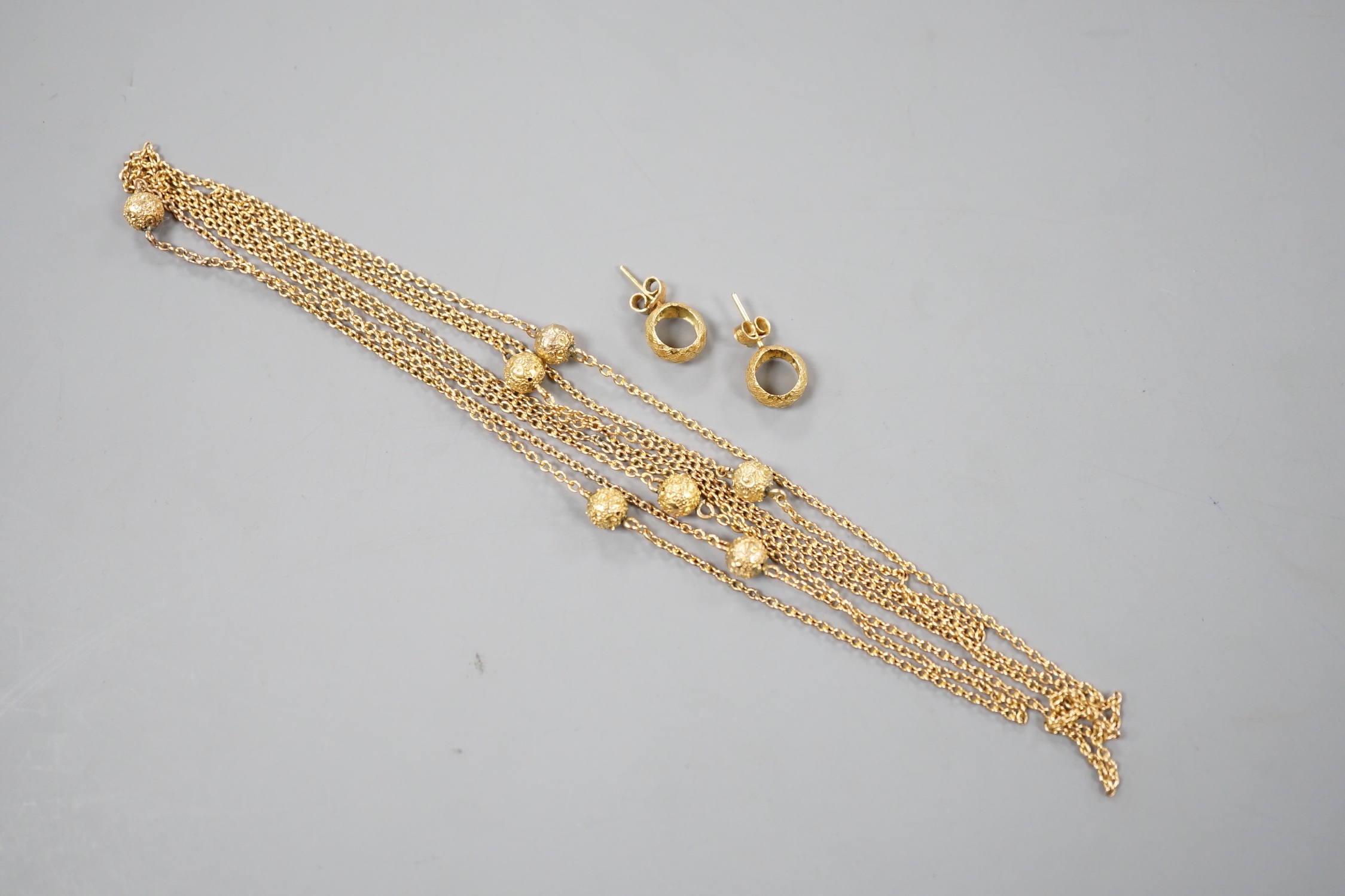 A 9ct guard chain with spherical spacers and a pair of 9k earrings, 11.7 grams.